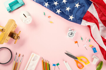 Back to school or college concept. Top view of school supplies stationery and American flag, studio shot isolated on pink background, Back to education new normal during outbreak of coronavirus © sorapop