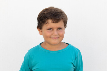 Beautiful child with blue eyes gesticulating