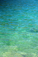 Sea foam and deep blue sea. Selective focus.