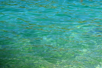 Sea foam and deep blue sea. Selective focus.