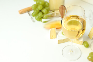 Concept of white wine tasting on white background