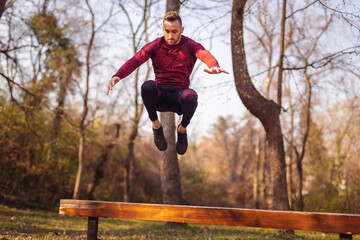 Man exercising in street workout park