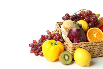 Basket with vegetables and fruits isolated on white background