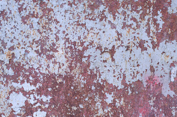 Old peeling paint. Rusty metal. Rusty iron structure.