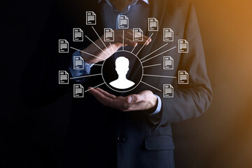 Document Management System DMS .Businessman hold user and document icon.Software for archiving, searching and managing corporate files and information.Internet Technology Concept.Digital security.