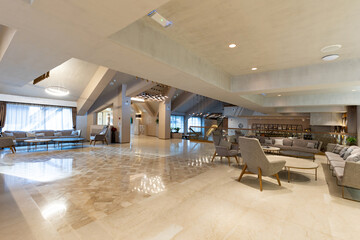 Above view to a hotel entrance lobby with marble floor