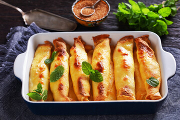 blintz, rolled filled with cottage cheese pancakes