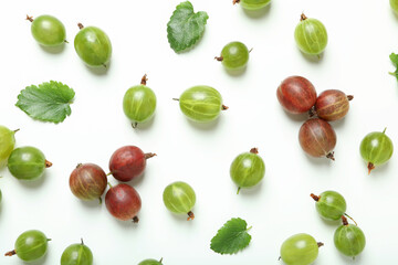 Green and red gooseberry on white background, close up