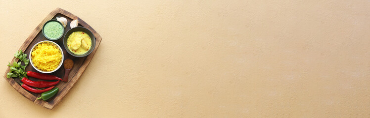 Board with traditional Indian food on color background with space for text