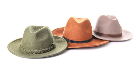 Stylish hats on white background