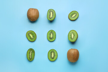 Fresh kiwi fruit with pieces on color background