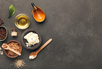 Different natural ingredients for homemade cosmetics on dark background