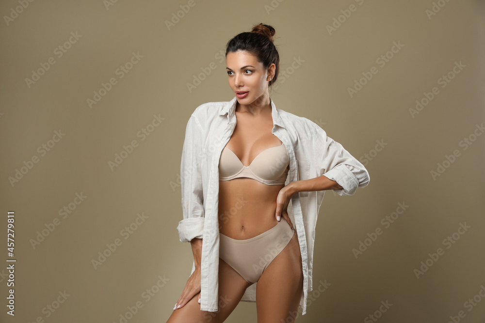 Canvas Prints Beautiful woman in panties on beige background