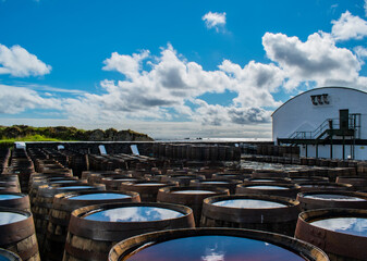 Casks and Barrels in a Whiskey distillery Islay in Scotland coast casks and barrels for Islay Whisky to get aged