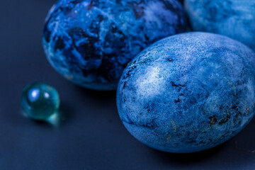 Close-up of blue easter eggs painted with natural dyes