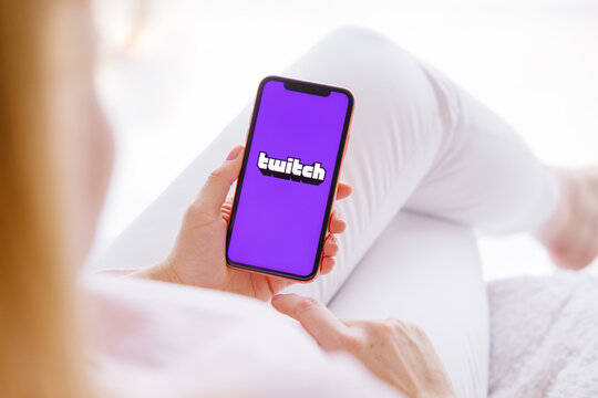 Riga, Latvia - March 26, 2021: Woman Holding Phone With Twitch Logo On The Screen