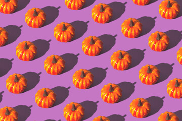 Seamless pattern with pumpkins.