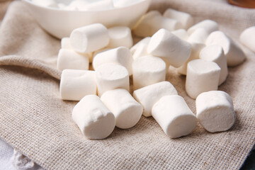 Fototapeta na wymiar Tasty marshmallows on table, closeup