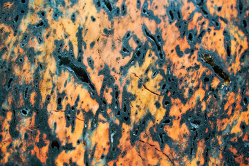 Mullite in close-up. Stone with an orange-black structure