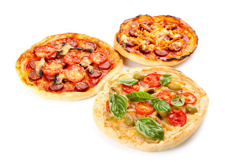 Tasty mini pizzas on white background