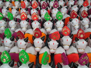 cows made out of clay for decoration purpose