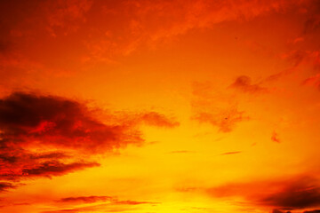 Colorful sunset. Red orange yellow sky with clouds. Beautiful bright evening sky background for...