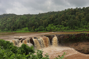 Top View of Gira Waterfall Waghai-Saputara, Gujarat- India. Waterfall surrounded with Beautiful Greenery  