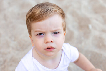 portrait of a little child,  child playing with sand, little child playing with sand, little child , playing with toys, toys, playing 