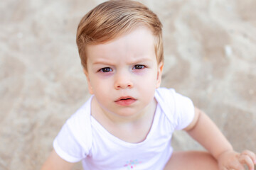 portrait of a little child,  child playing with sand, little child playing with sand, little child , playing with toys, toys, playing 