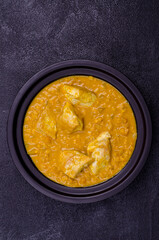 Curry with vegetables, lentils and meat