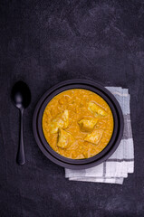 Curry with vegetables, lentils and meat