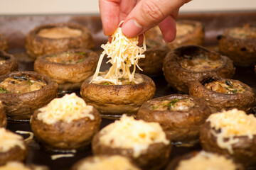 Cooking mushrooms with cheese. Cooking champignons stuffed with cheese in the electric oven