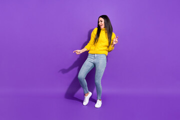 Fototapeta na wymiar Full length portrait of crazy positive person dancing have good mood open mouth isolated on purple color background
