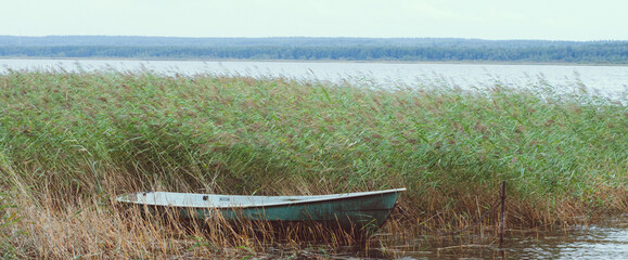 boat in the quiet harbor of the river