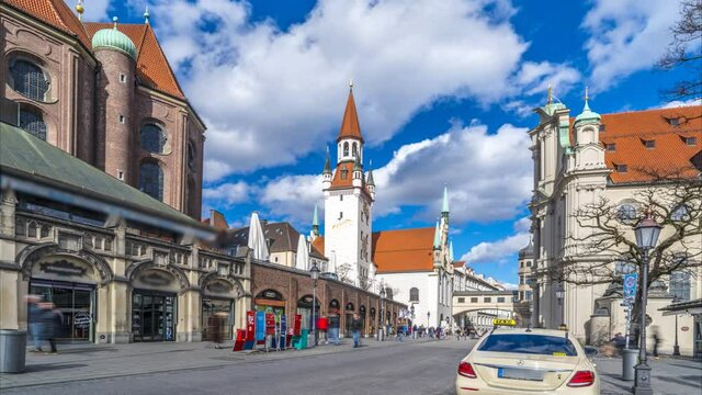 The Viktualienmarkt is one of the top sight s in the center of Munich hyperlapse time lapse video old town hall munich old town view street.
