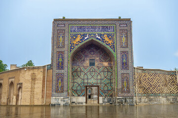 Entrance of Nadir Divan-Begi Madrasah in Samarkand, Uzbekistan. Building is notable for fact that...