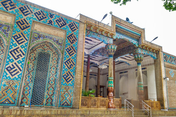 Painted walls and hall of Khoja-Ahrar summer mosque in Samarkand, Uzbekistan. Entrance to prayer hall is accessible directly from street, there are no doors. Mosque itself was founded in XV century