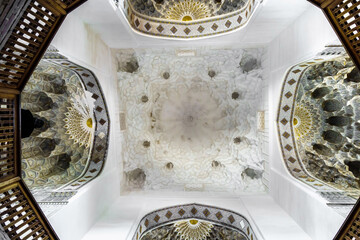 Bottom view of the vaulted ceiling or muqarnas of the medieval eastern mausoleum of Bibi-Khanym, 15th century. Shot in Samarkand, Uzbekistan