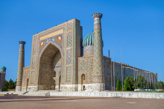 Sher-Dor Madrasah, one of most famous and oldest buildings in Samarkand, Uzbekistan. Contrary to Islamic traditions, facade of building is decorated with images of lions and deer