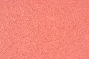 blank wall painted in light pink color. Space for Copy. Red.