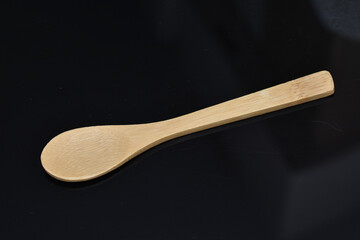 a wooden spoon about 10 cm
