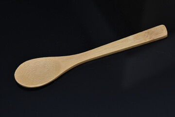 a wooden spoon about 10 cm