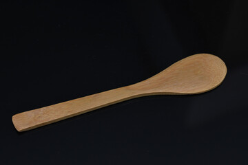 a wooden spoon about 10 cm