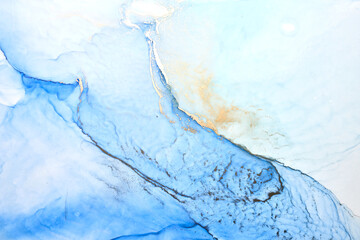 Luxury abstract background in alcohol ink technique, indigo blue gold liquid painting, scattered...