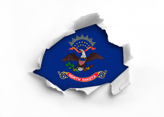 Flag of North Dakota underneath the ripped paper – realistic 3d rendering