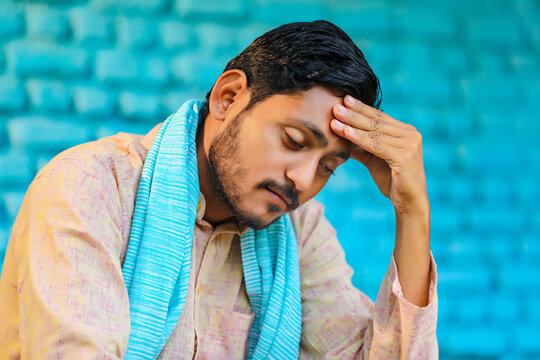 Young Indian Farmer In Depression.