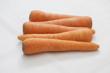 carrot spring food vegetables. Fresh big orange carrot texture background. Carrot Root Vegetable Product Pictures