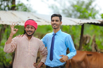 Indian agronomist or  animal husbandry officer visit at dairy farm 