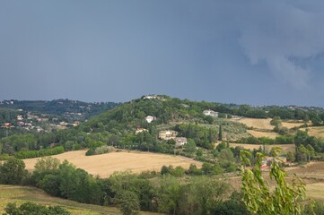 The view of a hilly landscape typical of the Tuscan countryside (Tuscany, Italy, Europe)