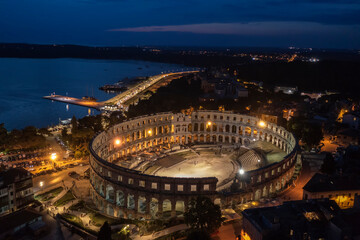 Pula amphitheatre by night, aerial view, Istria, Croatia